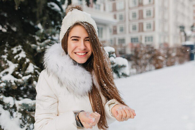 close-up-portrait-gorgeous-blonde-woman-holding-snow-hands-smiling-spectacular-woman-enjoying-winter-morning-yard-playing-with-someone_197531-1368.jpg
