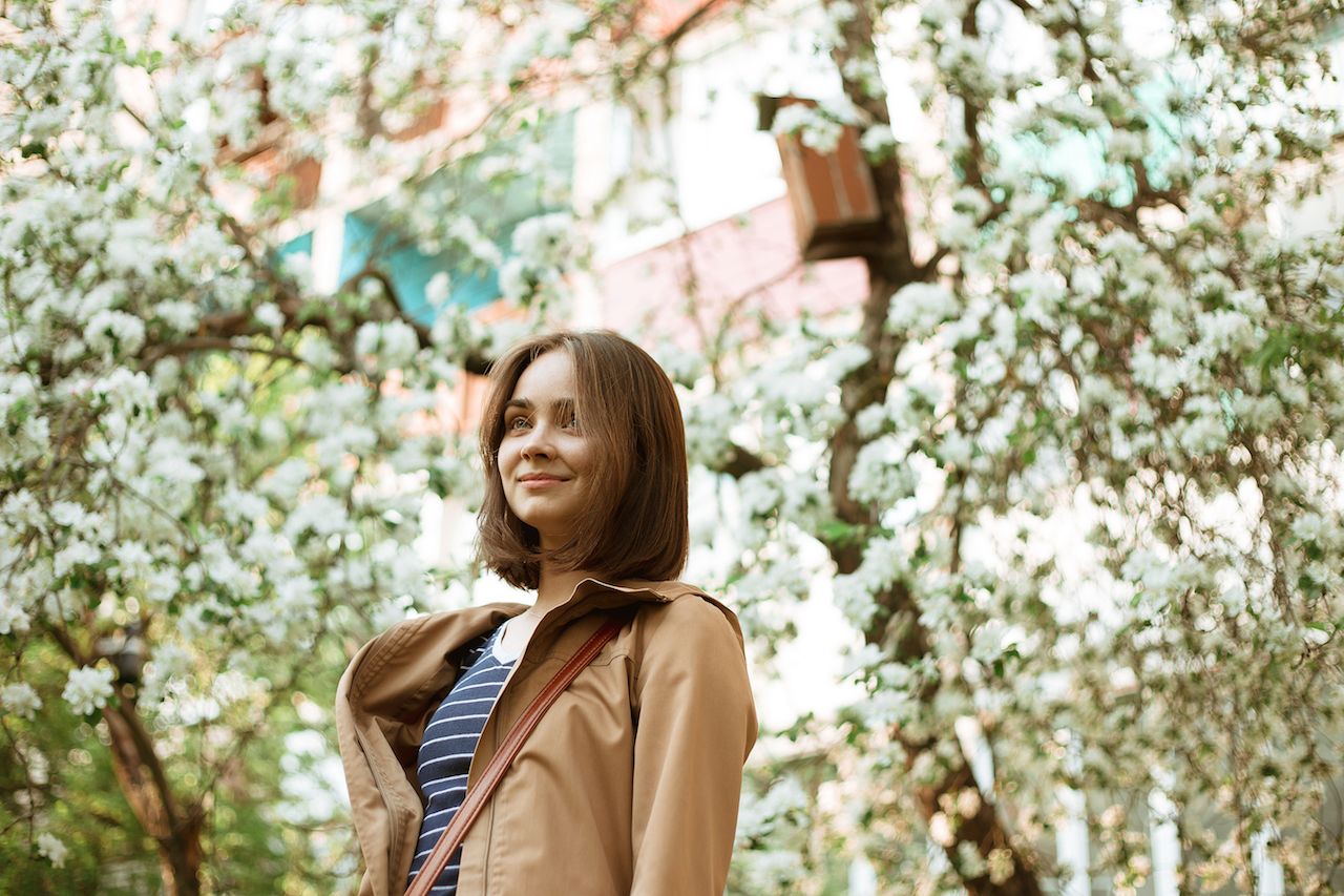 dreamy-woman-relaxing-blooming-garden-spring-standing-near-tree.jpg