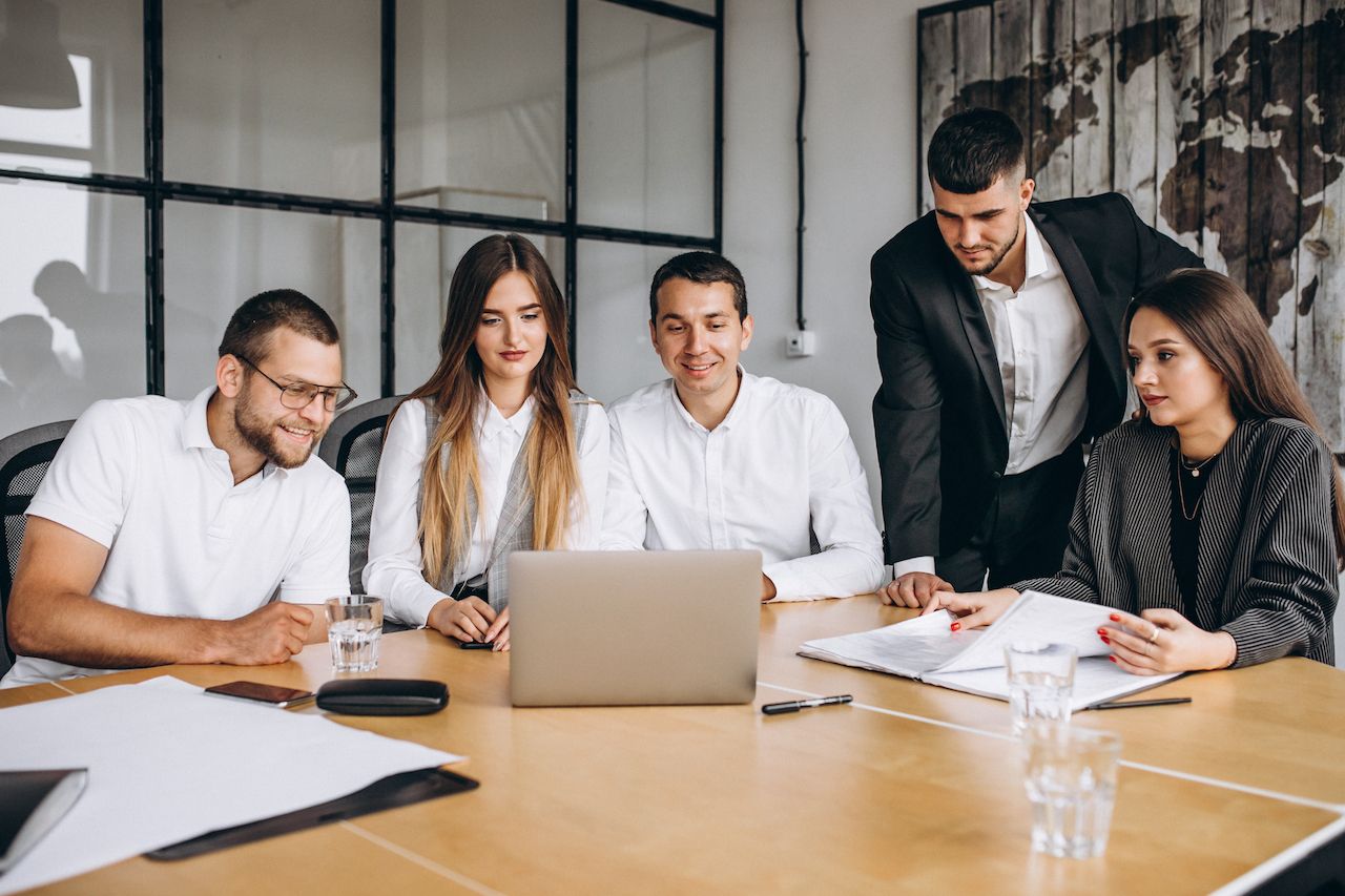 group-people-working-out-business-plan-office-2.jpg