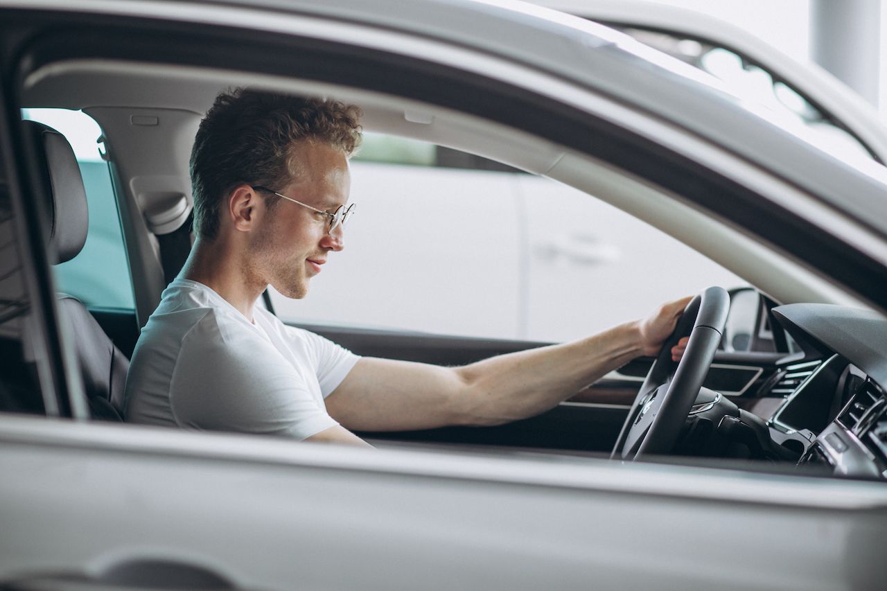 handsome-man-sitting-car.jpg