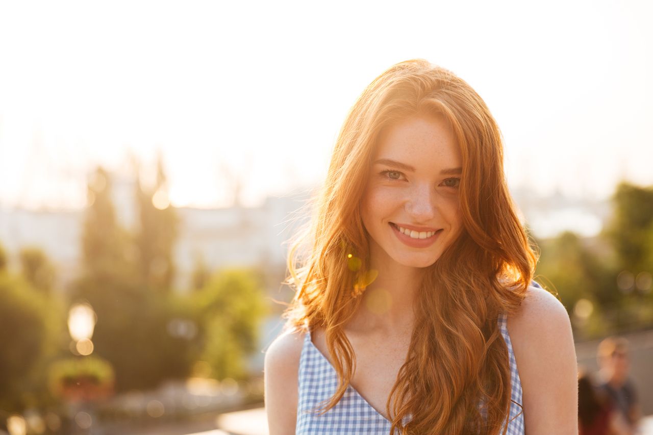 happy-pretty-redhead-woman-with-long-hair.jpg