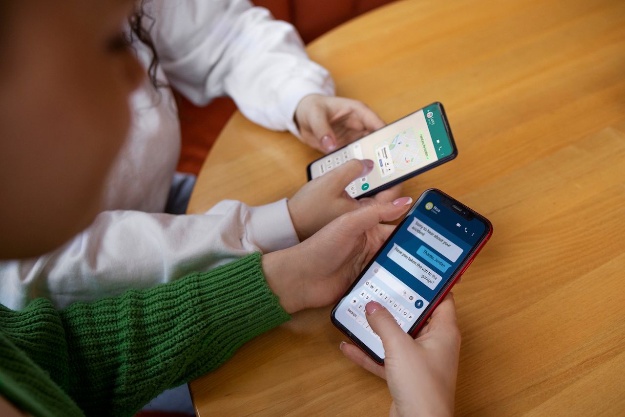 high-angle-friends-holding-smartphones (2).jpg