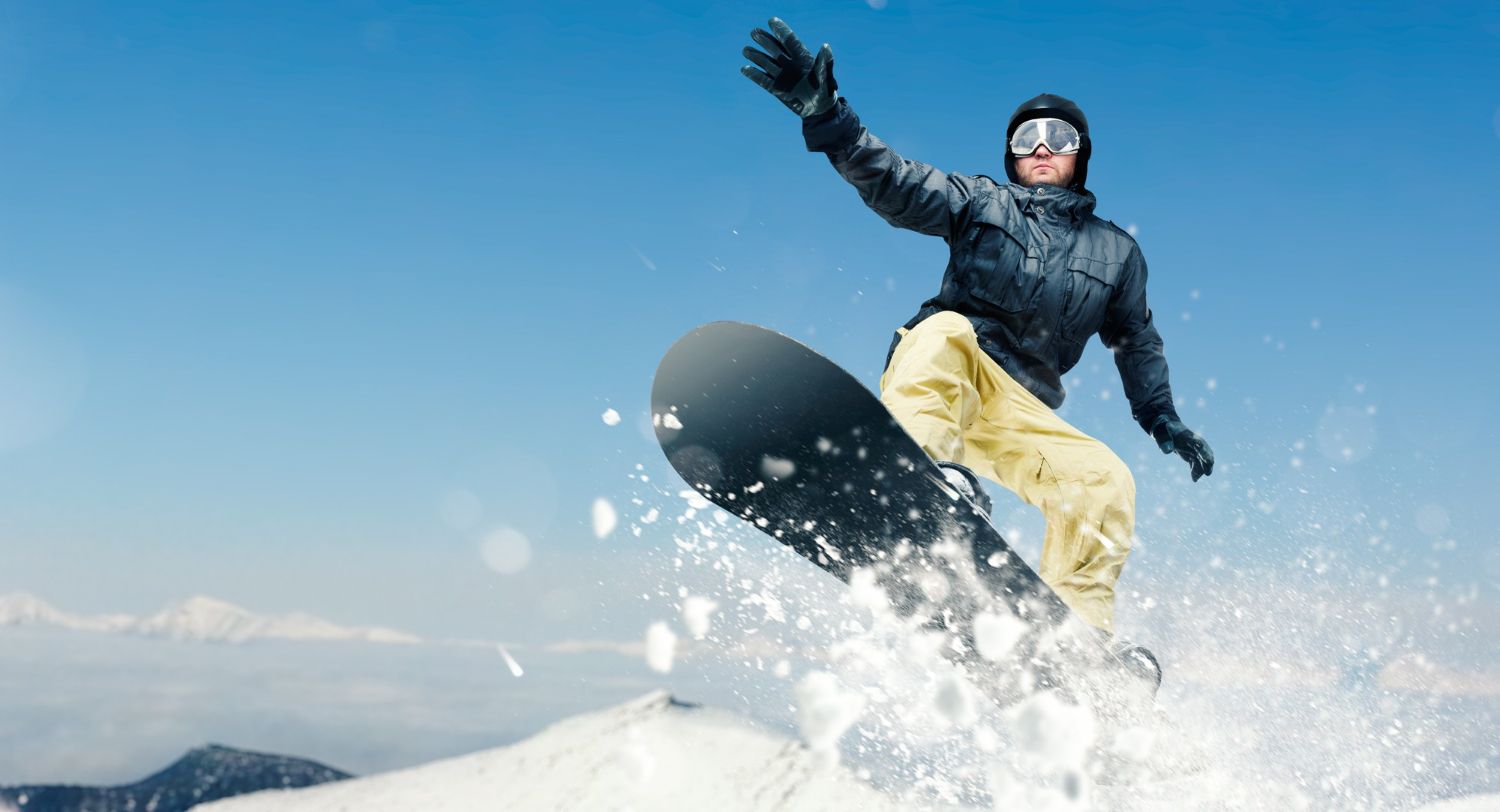 male-snowboarder-dangerous-downhill-action.jpg