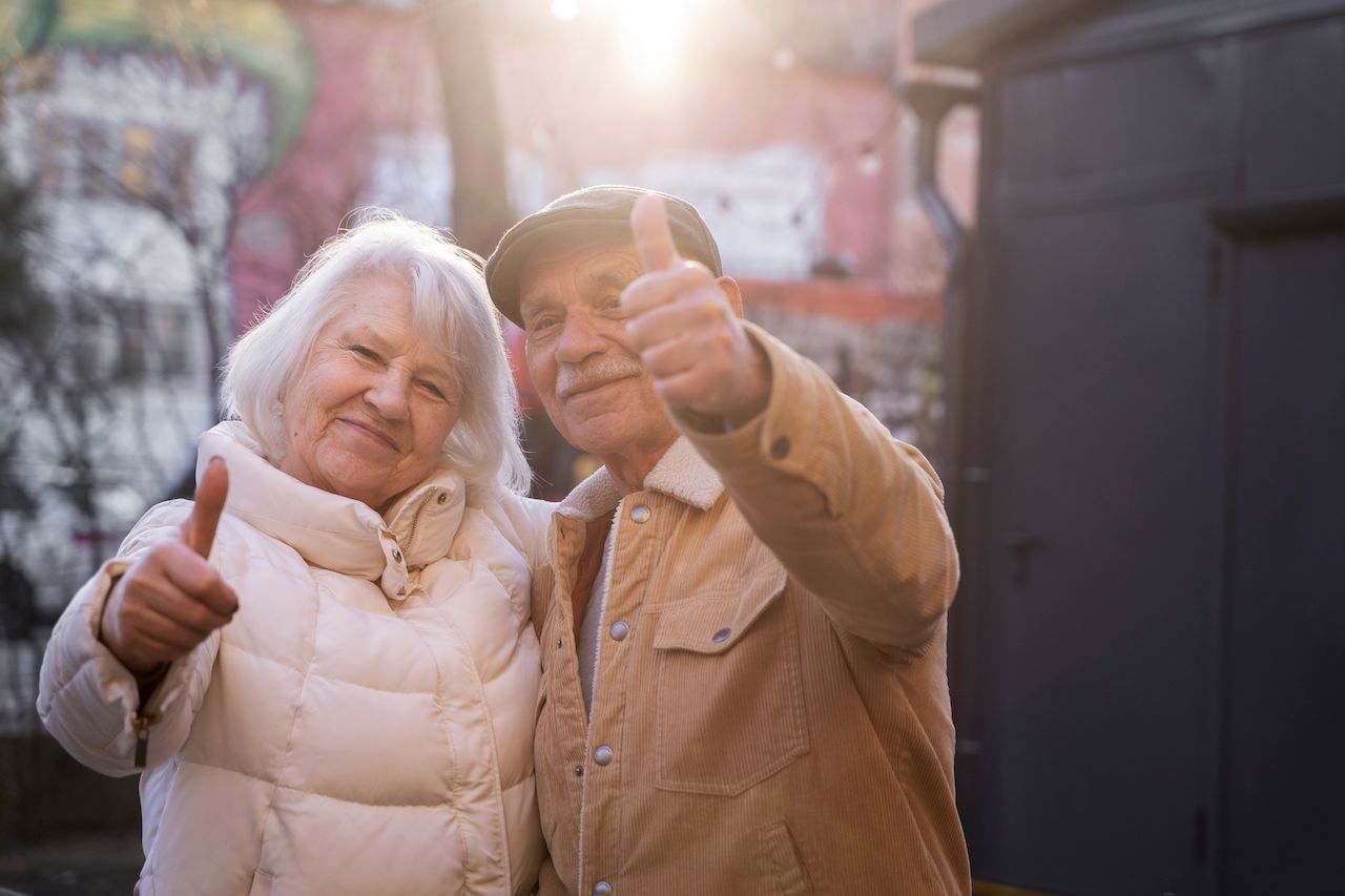 medium-shot-senior-people-showing-thumbs-up.jpg