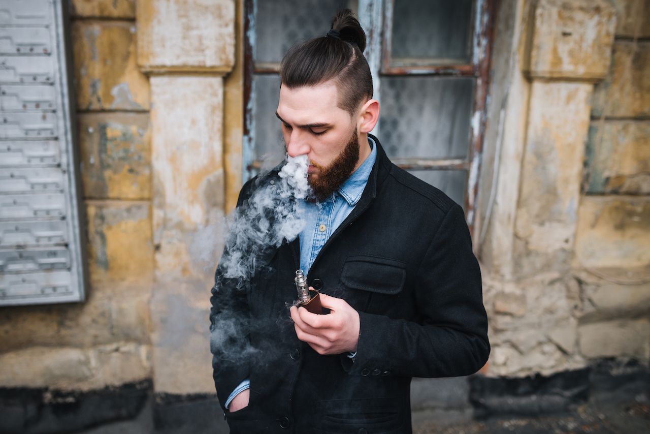 model-vaper-vaping-vaporizer-outdoors-safe-smoking-young-vaper.jpg