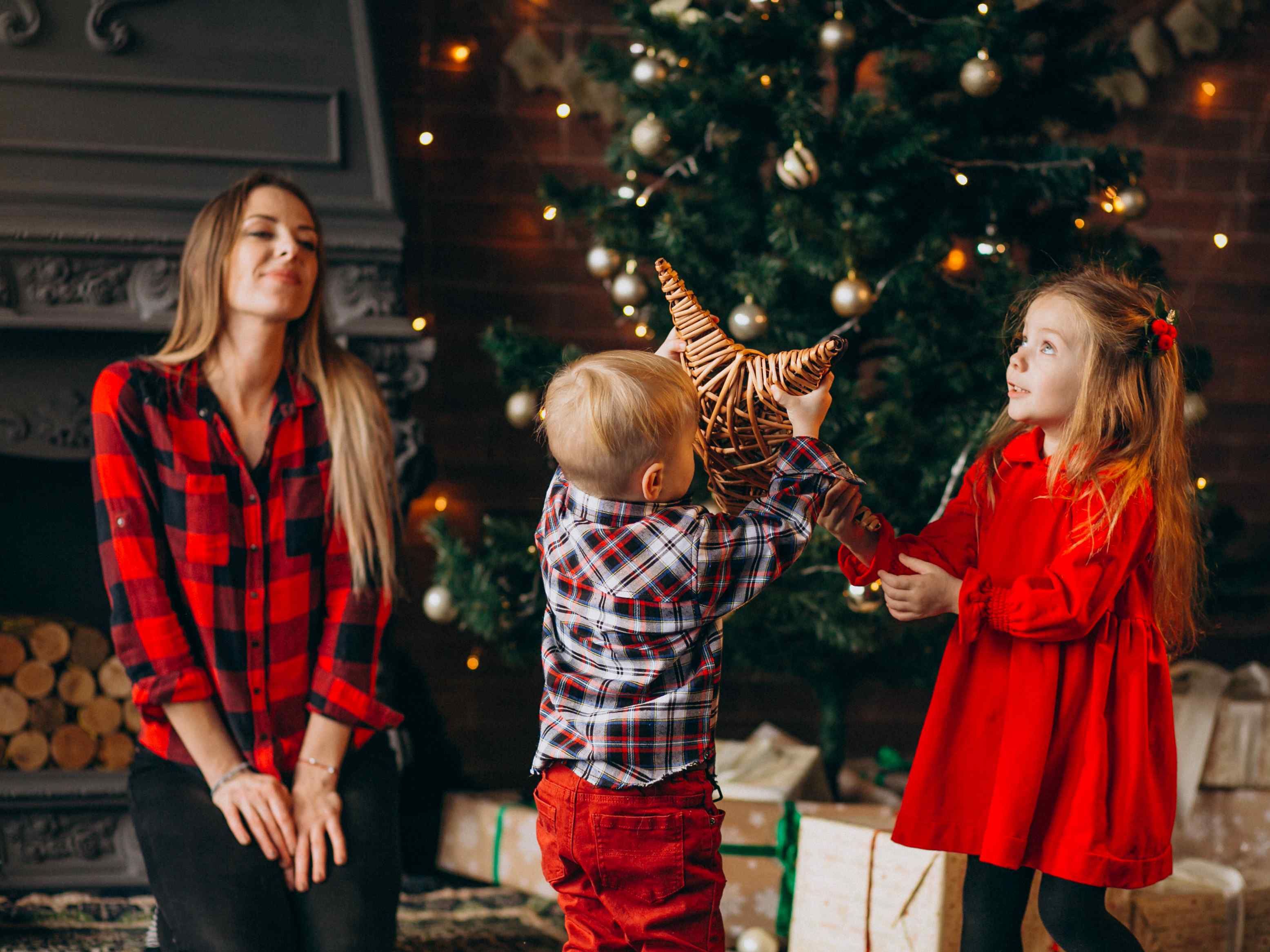 mother-with-children-by-christmas-tree (1).jpg