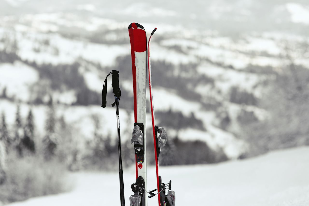 red-white-skis-put-snow-with-great-mountain-view-them.jpg