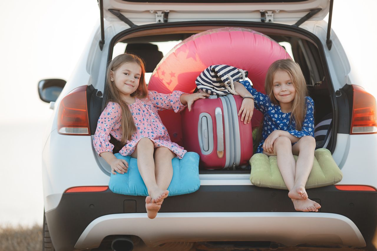 two-little-girls-dress-hat-outdoor.jpg