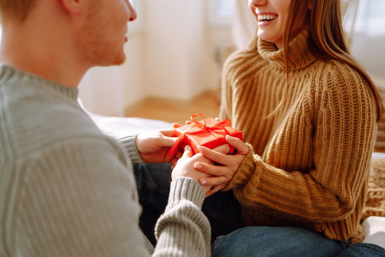 valentine-s-day-concept-exchange-gifts-young-couple-home-celebrating-valentine-s-day.jpg