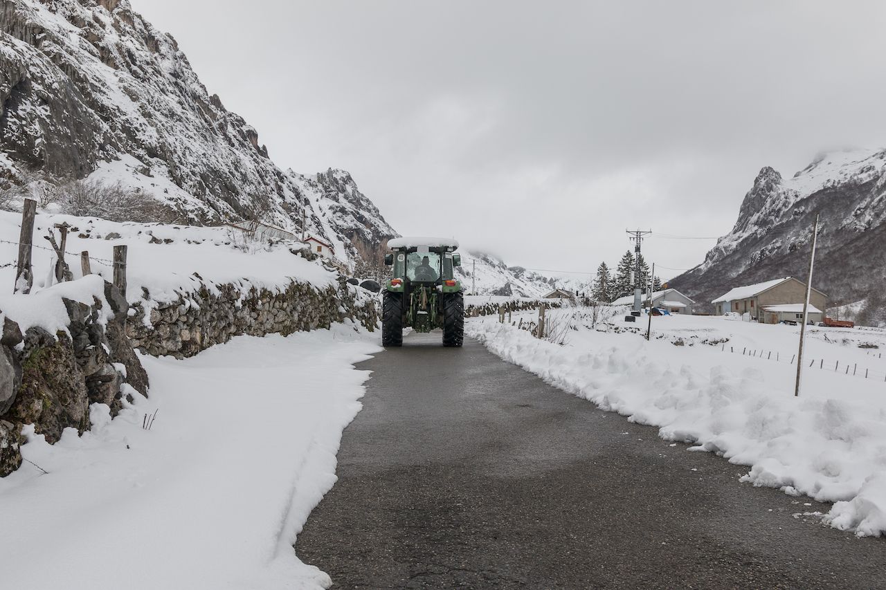 view-snow-tractor-clearing-road-after-snowstorm.jpg
